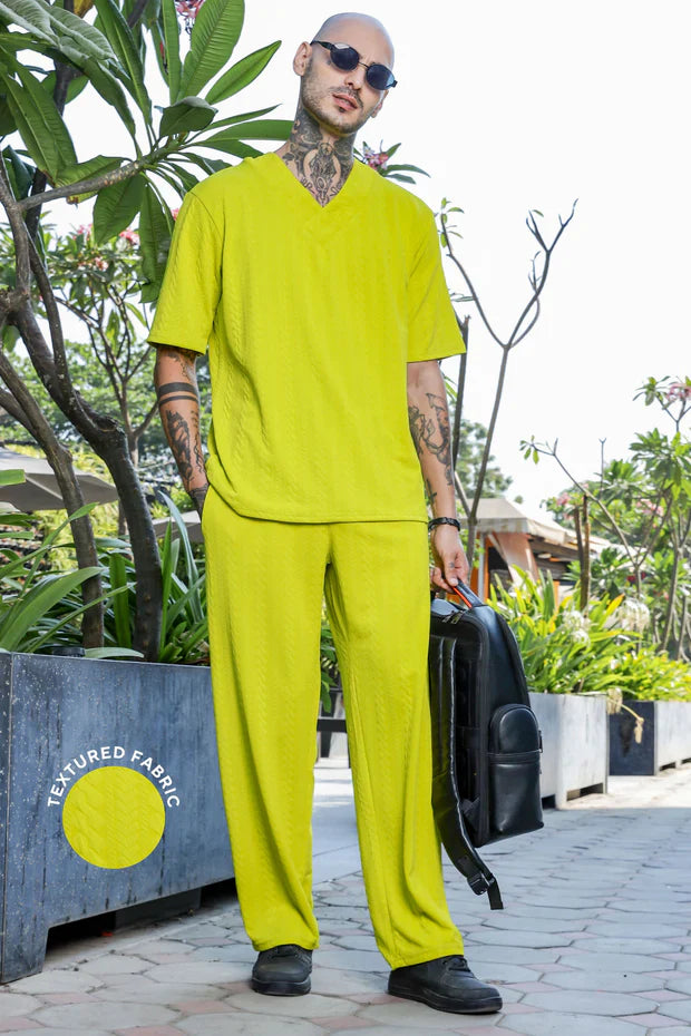 01_c7b21be1-e7d3-48d0-9ab9-550d1fd76715.jpg Unisex Lime Green Textured Oversized V-Neck Tee & Trackpant Co-ord Set - Image 1
