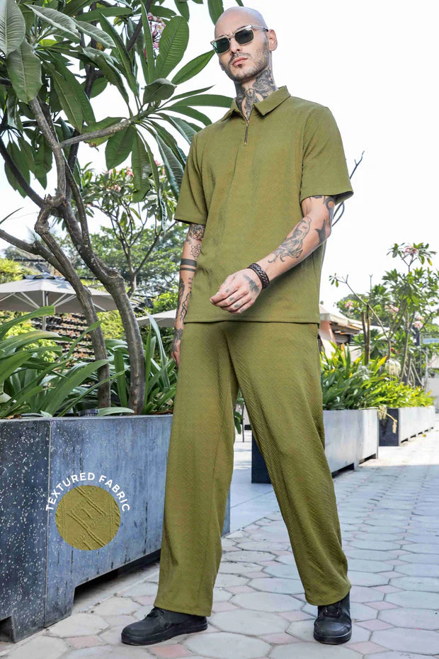 01_fc5eb33c-bd44-40cc-8260-03eaecd32684.jpg Olive Textured Oversized Polo Neck Tee & Track-pant Co-ord Set - Image 1