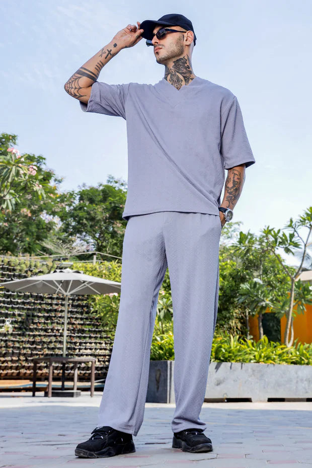 5_c645f7a5-bf23-479f-8753-a4ddd55831a3.jpg Unisex Grey Textured Oversized V-Neck Tee & Trackpant Co-ord Set - Image 1